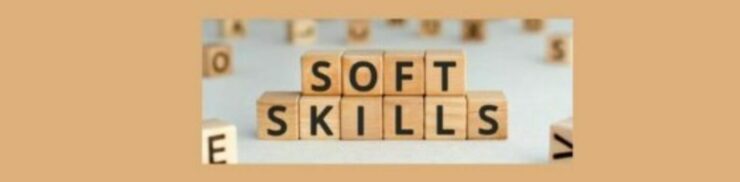 How to Boost Your Affiliate Marketing Performance with These Essential Soft Skills (3). Tan background, Blocks of wood stacked. SOFT in black letters on the top. SKILLS in black letter on the bottom Scatted blocks in the background out of focus. Left side block " E" fore front and right side top half of a " V" laying on its side.