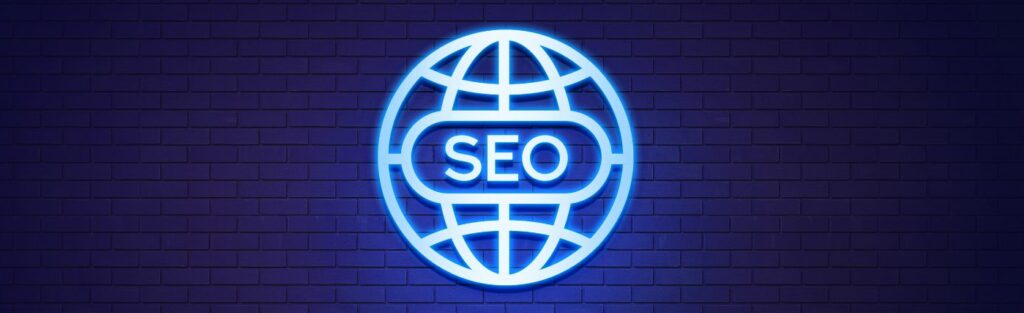 International SEO Strategies for Global Reach

Brick wall background cast in blue light of a international logo in silver,  SEO in silver in the center. 