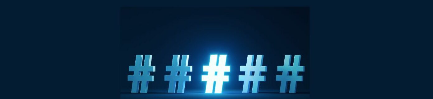 Effective Hashtag Strategies for Affiliate Marketers (6).
Dark blue background, darker blue square inside., 5 hashtag icons across, light blue, the middle illuminated.
