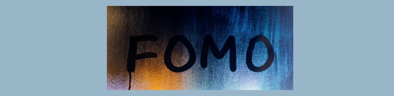 The Fear of Missing Out (FOMO) and Scarcity Marketing (2).
Light blue background, red, yellow, blue sparkled background
FOMO in bold black letters,  a long black line hanging from the "F".
