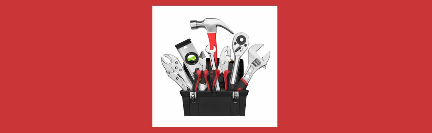 Social Media Tools for Efficient Affiliate Marketing (6).
Light red background.  White square, with bottom half black tool box, silver latches.
Silver pliers, silver level with green liquid measure, Red handled hammer with silver head, silver wrench, black and red handle wire cutters and pliers, silver ratchet, large black and red handle adjustable wrench with silver head. 