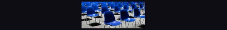 Can I Start Affiliate Marketing Without An Audience. Black background, rows and rows of empty blue plastic chairs on gray pavement.