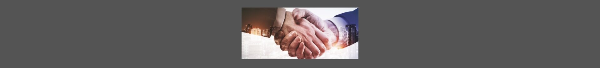 The Power Of Partnerships In Content Distribution. Dark gray background, al ight gray square, with two hands shaking, left dark sleeve, right blue sleeve, with white shirt cuff.